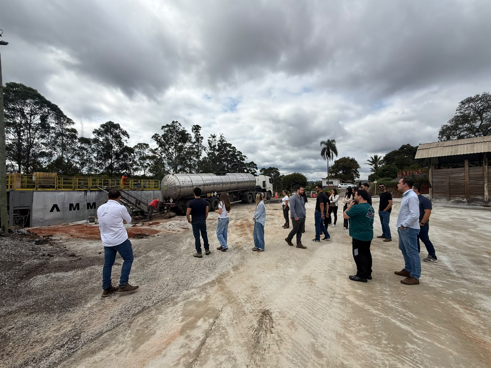 Students touring the mobile asphalt plant's operational area