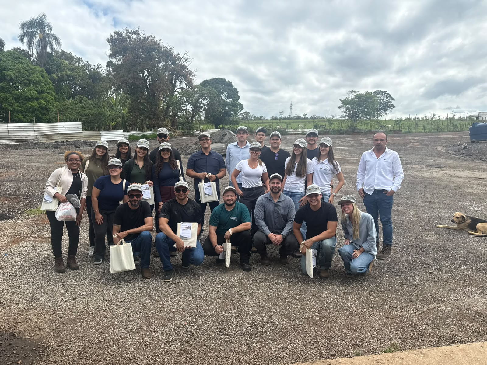 Field visit group gathered outside the asphalt plant